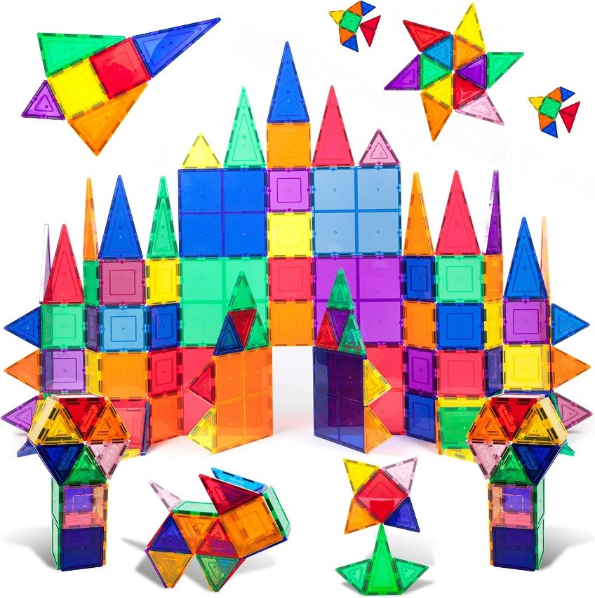 Multi-color tiles in varying sizes of squares and triangles arranged to form a castle, rocket, dog, and other varied creations.